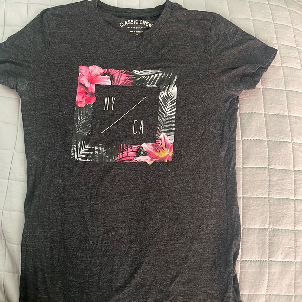 Aeropostale t-shirt. Kinda tighter fitting then regular T-shirt’s do.